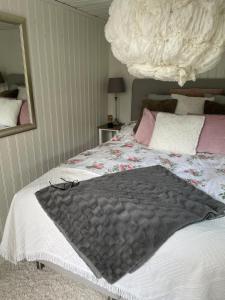 A bed or beds in a room at Bed&Breakfast M&M