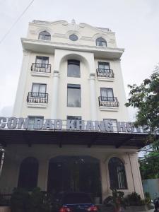 a white building with a sign that readson the badalam kidnap bite at KHANG HOTEL CON DAO in Con Dao