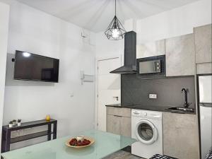 Kuchyň nebo kuchyňský kout v ubytování Modernos Apartamentos en Ciudad Jardín Córdoba