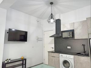 Kuchyň nebo kuchyňský kout v ubytování Modernos Apartamentos en Ciudad Jardín Córdoba