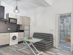 Kuchyň nebo kuchyňský kout v ubytování Modernos Apartamentos en Ciudad Jardín Córdoba