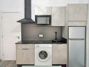 Kuchyň nebo kuchyňský kout v ubytování Modernos Apartamentos en Ciudad Jardín Córdoba