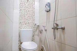 Koupelna v ubytování RedDoorz Premium @ Griya Inkoppabri Cisarua Puncak