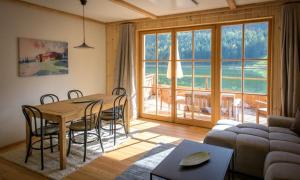 A seating area at CHALET am Schneeberg See