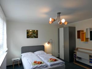 Tempat tidur dalam kamar di Apartament A2D Kraków