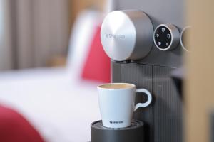 Příslušenství pro přípravu čaje a kávy v ubytování Ocak Hotel
