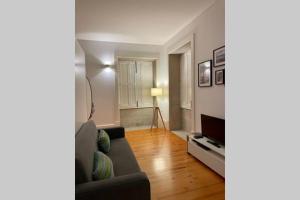 Een zitgedeelte bij Santo António Cozy Apartment