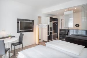 Кровать или кровати в номере INNSiDE by Meliá Frankfurt Ostend