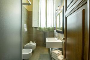 Ванная комната в Mamo Florence - Indipendenza Apartment