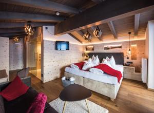 Postel nebo postele na pokoji v ubytování Hotel Goldknopf