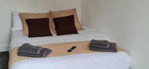 Postel nebo postele na pokoji v ubytování The Selbourne Hotel