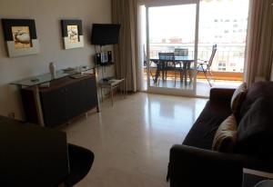 Μια τηλεόραση ή/και κέντρο ψυχαγωγίας στο Luxury Apartment in Los Boliches
