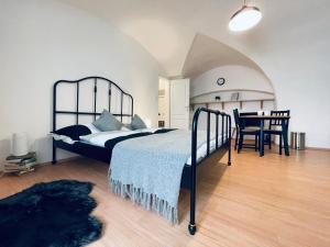 Voodi või voodid majutusasutuse Studio Nicolas II Prague toas