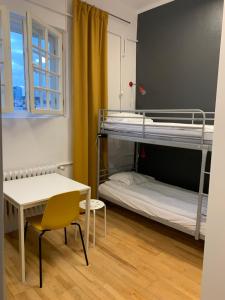Posteľ alebo postele v izbe v ubytovaní New World St Hostel and Private Room