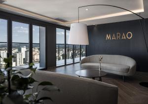 a living room with a couch and a table at Senator Gandia in Gandía
