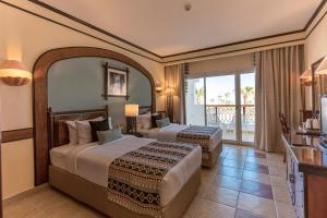 Кровать или кровати в номере Sunrise Remal Resort