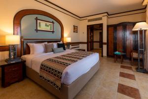Кровать или кровати в номере Sunrise Remal Resort