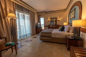 Кровать или кровати в номере Sunrise Remal Resort