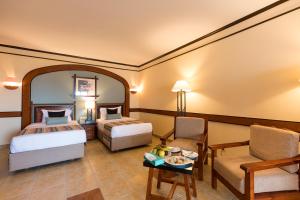 Кровать или кровати в номере Sunrise Remal Resort