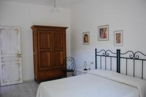 A bed or beds in a room at Andrea E Valentina