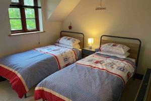 Katil atau katil-katil dalam bilik di Cottage With Hot Tub in Pembrokeshire