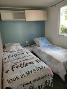 Posteľ alebo postele v izbe v ubytovaní Mobil home 6 places