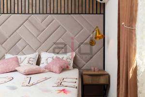 Łóżko lub łóżka w pokoju w obiekcie PULA PORTA AUREA & Wellness Oasis