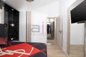 Telewizja i/lub zestaw kina domowego w obiekcie PULA PORTA AUREA & Wellness Oasis
