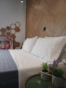 Postel nebo postele na pokoji v ubytování Sroom Apartment