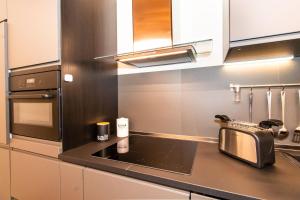 Kuchyňa alebo kuchynka v ubytovaní Stylish Quardilatero Romano Central Flat