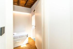 Posteľ alebo postele v izbe v ubytovaní Stylish Quardilatero Romano Central Flat