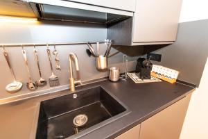 Kuchyňa alebo kuchynka v ubytovaní Stylish Quardilatero Romano Central Flat