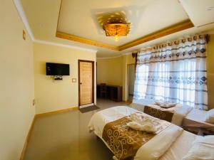Postel nebo postele na pokoji v ubytování Mariana Maldives