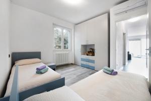A bed or beds in a room at Casa Andrea