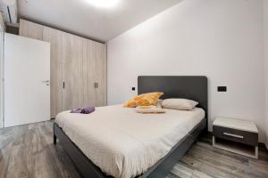 A bed or beds in a room at Casa Andrea