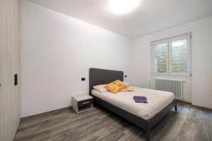 A bed or beds in a room at Casa Andrea