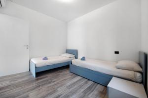 A bed or beds in a room at Casa Andrea