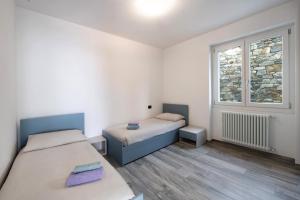 A bed or beds in a room at Casa Andrea
