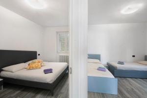 A bed or beds in a room at Casa Andrea