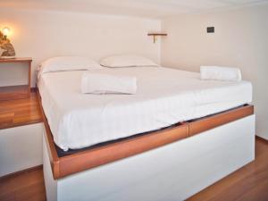 Posteľ alebo postele v izbe v ubytovaní Medusa Apartment - Monolocale Centro