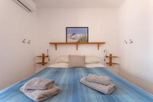 Posteľ alebo postele v izbe v ubytovaní Capistrano Playa + 17 fotografií
