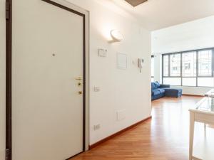Posteľ alebo postele v izbe v ubytovaní easyhomes-Madonnina View