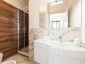 Kúpeľňa v ubytovaní easyhomes-Madonnina View