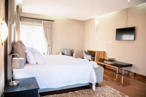 Schimper View Boutique Guest House客房内的一张或多张床位