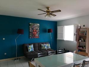 منطقة جلوس في Rose phoenix appartement terrasse et piscine vue mer