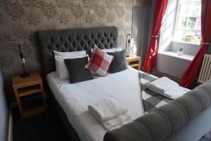מיטה או מיטות בחדר ב-The Barge Inn