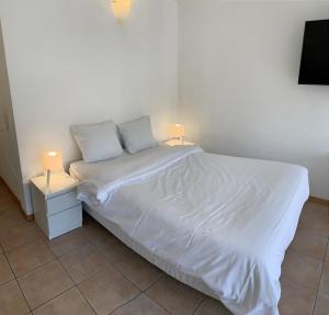 Letto o letti in una camera di Residence Vue Chateau