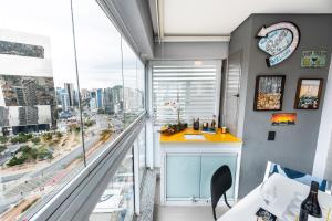 Pića u objektu Homelike Faria Lima by Okaeri Home Vista Incrível, Piscina e Estacionamento em Pinheiros