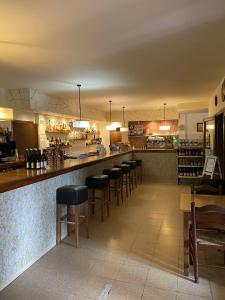 Restoranas ar kita vieta pavalgyti apgyvendinimo įstaigoje Hostatgeria i Restaurant Coll de Condreu