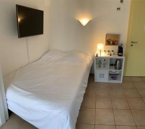 Letto o letti in una camera di Residence Vue Chateau